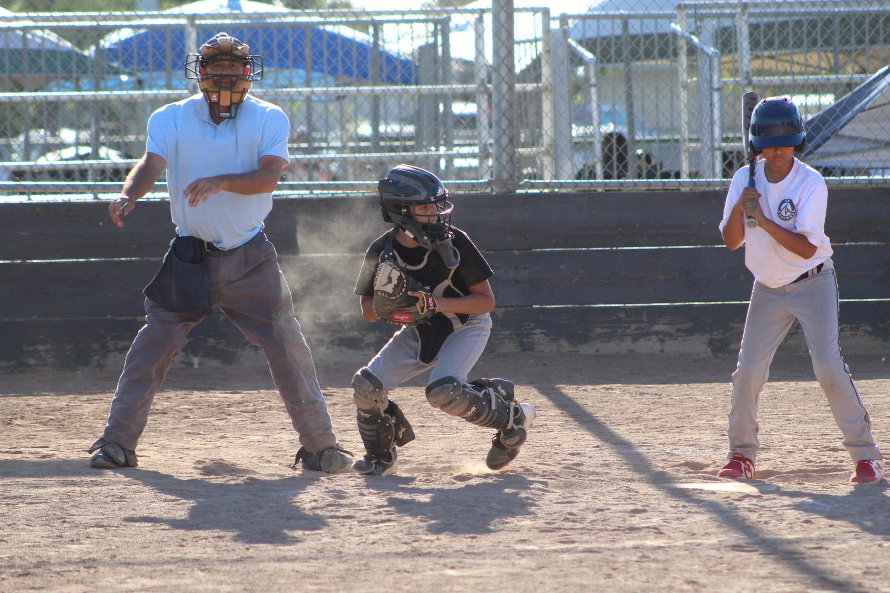 Luke Sevilla preparing to throw from catcher