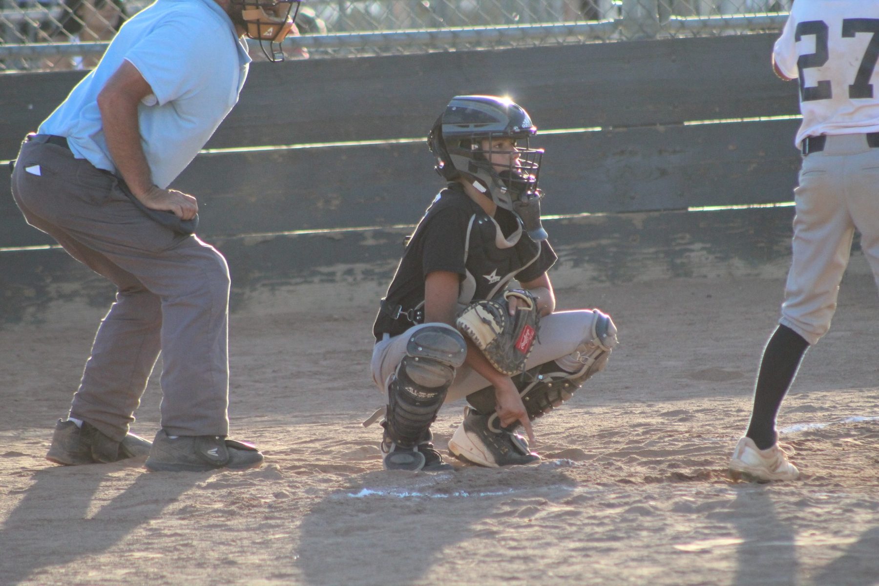 Luke Sevilla giving catcher signs