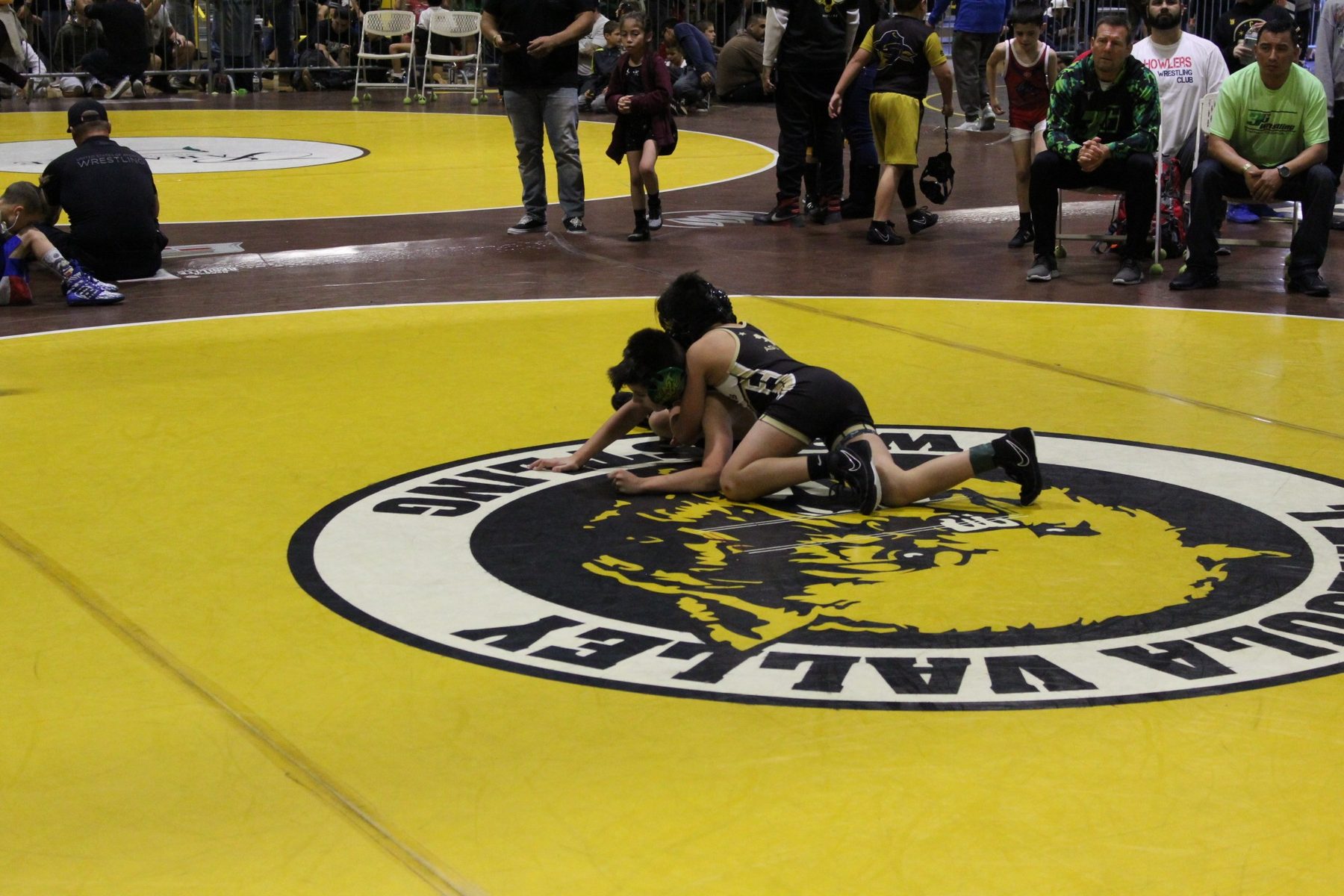 Luke Sevilla competing in youth wrestling