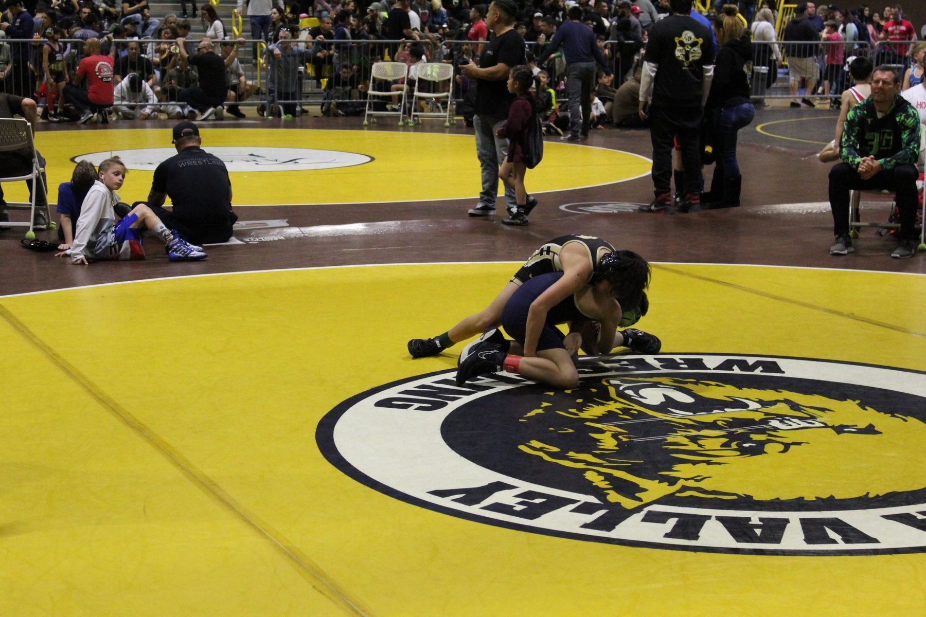 Luke Sevilla competing at a youth wrestling tournament